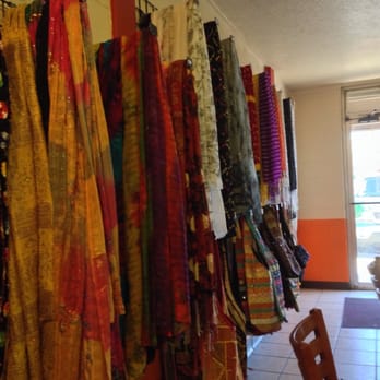 Bombay Cafe - Purses & scarves for sale are displayed on one of the walls. - Indian Near Me - St. George, Utah Bombay Cafe - Purses & scarves for sale are displayed on one of the walls. - Indian Near Me - St. George, Utah