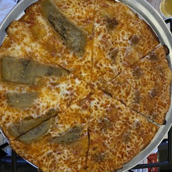 Riko's Pizza - Half breaded eggplant (left) half spicy sausage (right) - Pizza Near Me - Levittown, New York Riko's Pizza - Half breaded eggplant (left) half spicy sausage (right) - Pizza Near Me - Levittown, New York