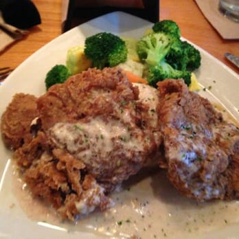 BJ's Restaurant & Brewhouse - Chicken fried steak, on bed of mashed potatoes and fresh veggies. The steak is a bit thick. - Breweries Near Me - Phoenix, Arizona