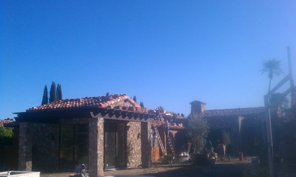 Slide of Foam Bond-A Quality Roofing