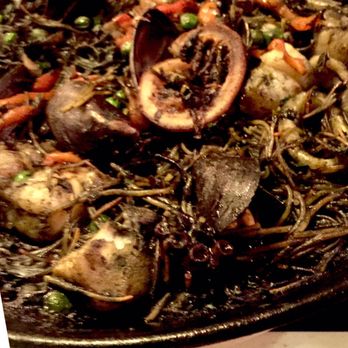 Oyo - Paella Negra - paella made with fideo pasta instead of rice. Interesting take but too salty. - Latin American Near Me - Pleasanton, California Oyo - Paella Negra - paella made with fideo pasta instead of rice. Interesting take but too salty. - Latin American Near Me - Pleasanton, California