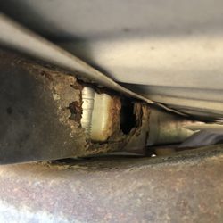Collision Pros of Thomson - Rust underneath the replacement bed