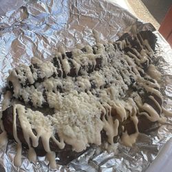 Delicias Salvadorenas - Fried plantains with cheese and crema.