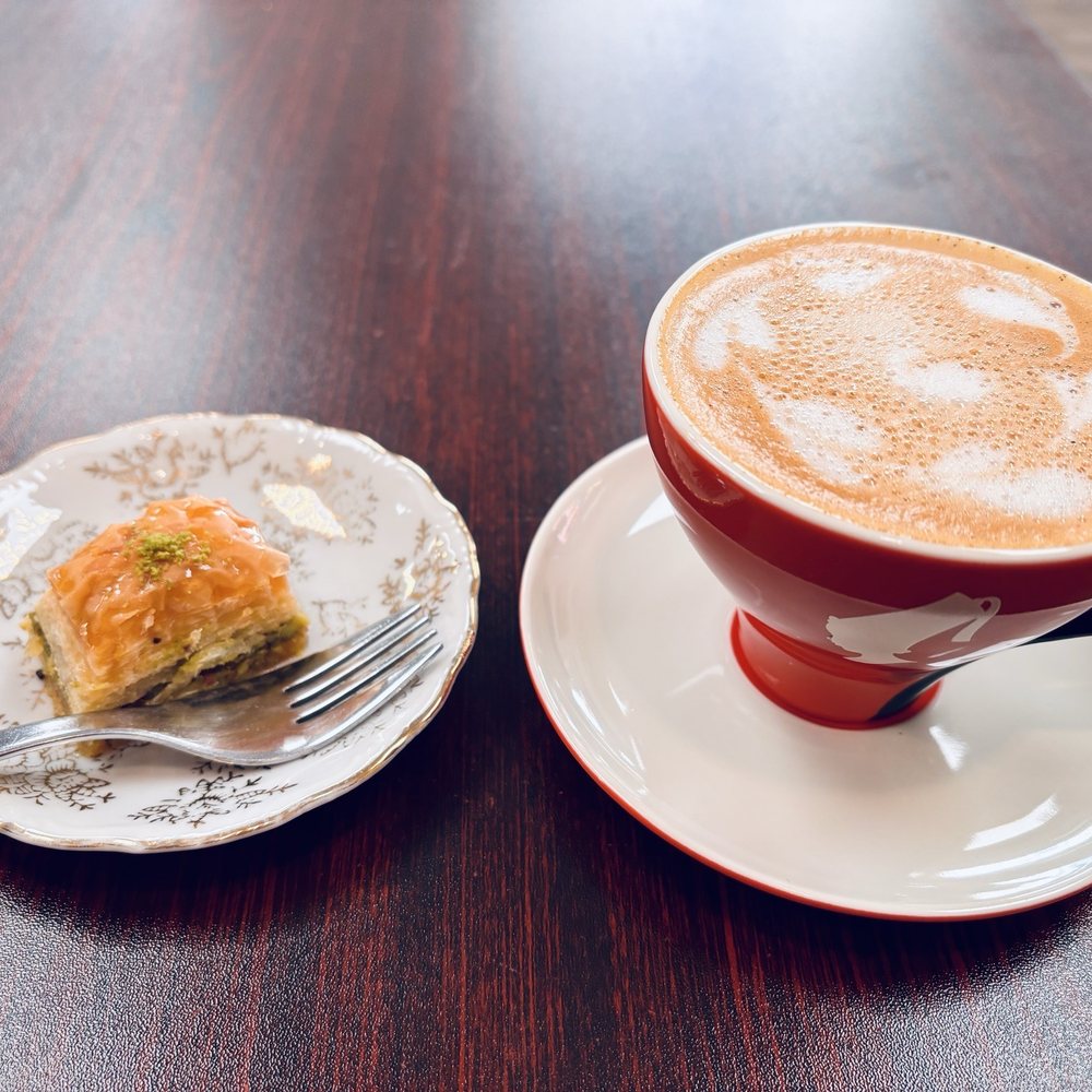 Akida Coffeehouse - classic baklava + decaf oat milk cappuccino - Breakfast & Brunch Near Me - Woodbridge, Virginia