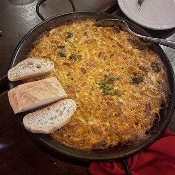 Toro Kitchen + Bar - Arroz con costra paella - Tapas Bars Near Me - San Antonio, Texas Toro Kitchen + Bar - Arroz con costra paella - Tapas Bars Near Me - San Antonio, Texas