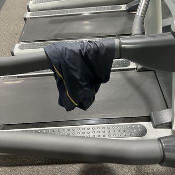 Fitness 19 - Clothes hanging on treadmills - Gyms Near Me - Rancho Cucamonga, California