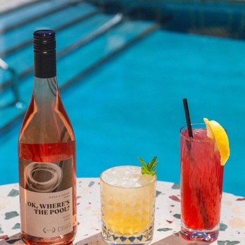 Pool Bar - two cocktails and a bottle of wine - Salad Near Me - Oklahoma City, Oklahoma Pool Bar - two cocktails and a bottle of wine - Salad Near Me - Oklahoma City, Oklahoma