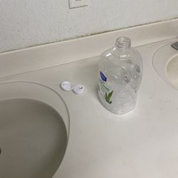Soap container filled with water