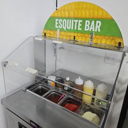 Elote or esquite bar, with a variety of free toppings that's so cool!