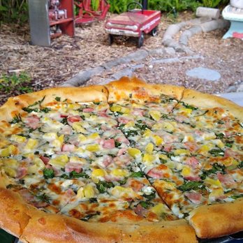 Satchel's Pizza - Ricotta base, pineapple, ham and spinach. - Pizza Near Me - Gainesville, Florida