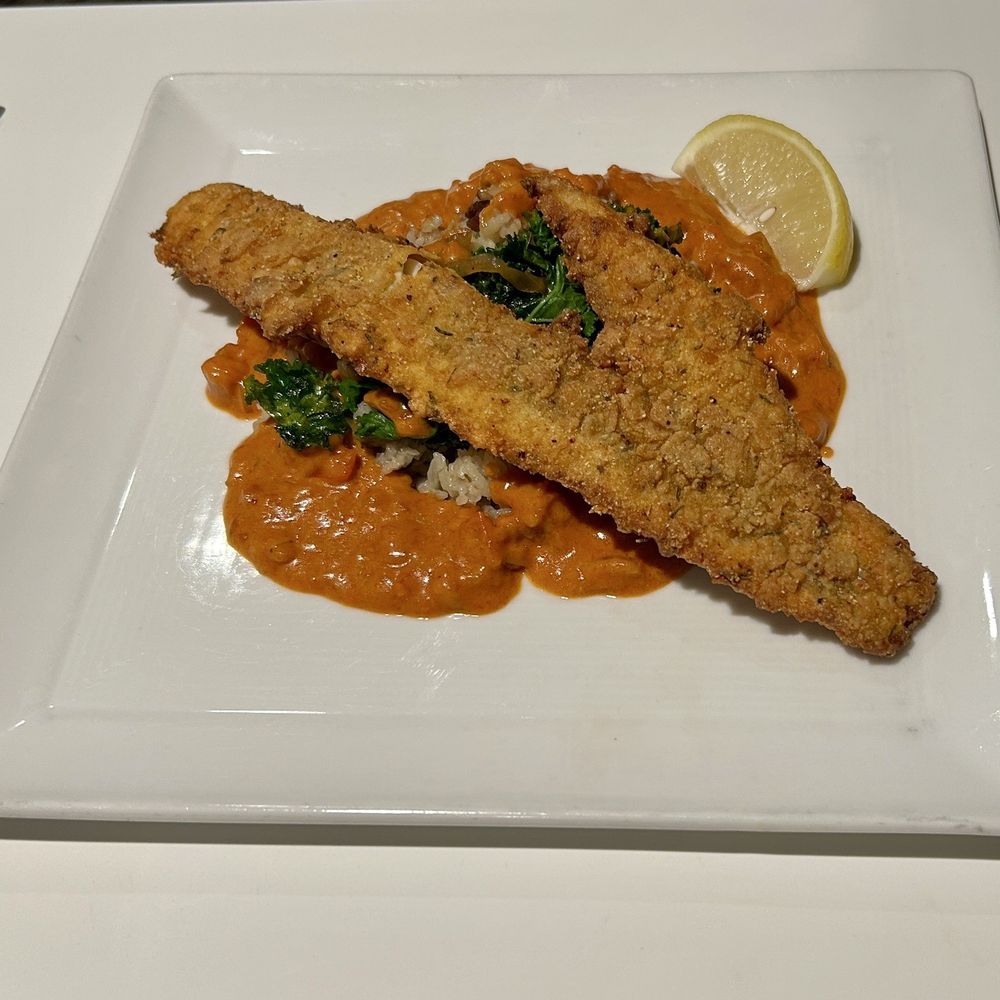 The Class Act - Pecan crusted walleye with Creole cream sauce - New American Near Me - Cedar Rapids, Iowa The Class Act - Pecan crusted walleye with Creole cream sauce - New American Near Me - Cedar Rapids, Iowa