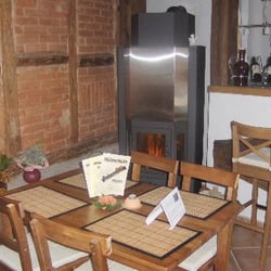 Mühlenschenke Bleckerruh - Blick auf das gemütlich lodernde Ofenfeuer