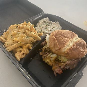 Rockin’ Q BBQ Company - Pulled pork sandwich, Mac and cheese, and potato salad . - Barbeque Near Me Rockin’ Q BBQ Company - Pulled pork sandwich, Mac and cheese, and potato salad . - Barbeque Near Me