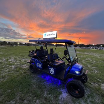Zip Ride - a golf cart in a field at sunset - Tours Near Me - Tampa, Florida