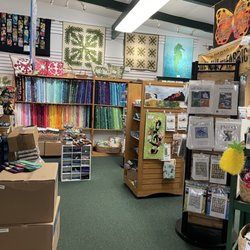 Kilauea Kreations - Roomful of beautiful quilting material.