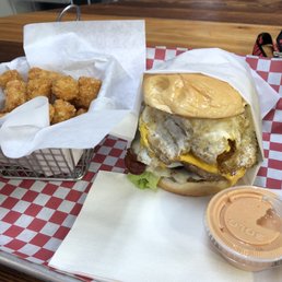 Rex's burger with small tots Rex's burger with small tots