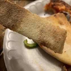 By The Fire Pizza - Cheese stick who decided halfway through it's shift it was Tim to go so the bottom half didn't finish cooking