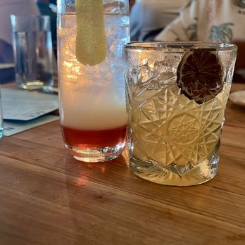 The Optimist - Second Sunrise mocktail with citrus garnished with citrus & Castaway cocktail - Seafood Near Me - Atlanta, Georgia