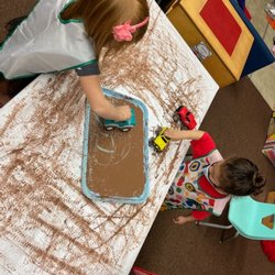 The Cole Academy - Mililani - Having fun while learning about transportation and making muddy tire prints!