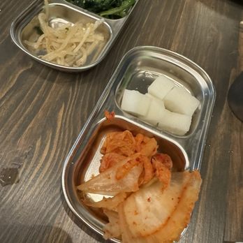 Chingu - Banchan aka side dishes: kimchi, daikon pickles, spinach .. - Tapas Bars Near Me - San Mateo, California