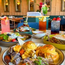 Kan Kiin Brunch & Thai Eatery - Sweet corn cake and fresh crab benedict (Served with Potato wedges and Thai cucumber salad with homemade  peanut sause dressing)