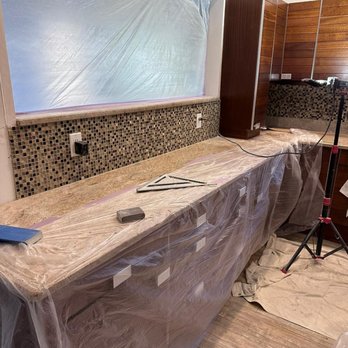 Intex Painting - Kitchen prep. They painted and applied tile backsplash - Painters Near Me