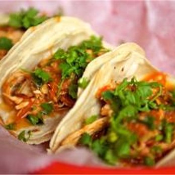 Tacos A Go Go Midtown - two tacos in a basket - Tex-Mex Near Me - Houston, Texas Tacos A Go Go Midtown - two tacos in a basket - Tex-Mex Near Me - Houston, Texas