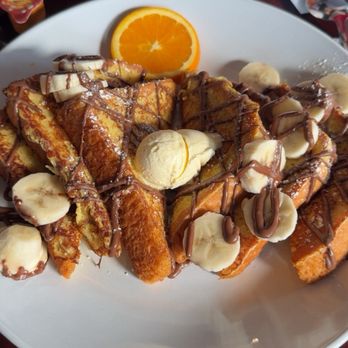 Hotcakes Emporium Northside - Banana Nutella French toast. - American Near Me - Indianapolis, Indiana Hotcakes Emporium Northside - Banana Nutella French toast. - American Near Me - Indianapolis, Indiana