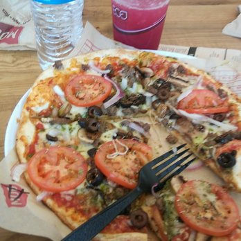 MOD Pizza - MAD DOG minus the sausage and pepperoni- add tomatoes, olives, pesto, garlic, rosemary/thyme/oregano.  MOD Pizza-YUMM - Pizza Near Me - Long Beach, California