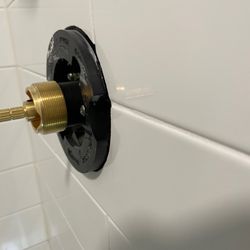 Old Mill Remodel and Restoration - The black piece is supposed to be flush with the white tile so that the handle can be tightened down.