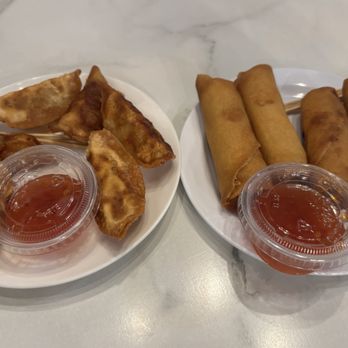 Chop Asian Kitchen - Fried Dumplings ($6.99) and Spring Rolls ($6.99) with dipping sauce. - Chinese Near Me - Yucaipa, California Chop Asian Kitchen - Fried Dumplings ($6.99) and Spring Rolls ($6.99) with dipping sauce. - Chinese Near Me - Yucaipa, California