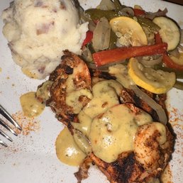 Blacken salmon and with blackened shrimp with mixed vegetables with mashed potatoes.