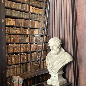 The Book of Kells - Bookcase in the Long Room. - Museums Near Me - Dublin, D The Book of Kells - Bookcase in the Long Room. - Museums Near Me - Dublin, D