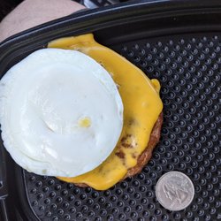 McDonald's - $6.19 + tax on the breakfast menu (quarter not included)