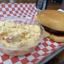 BBQ burger with potato salad. Delicious BBQ burger with potato salad. Delicious