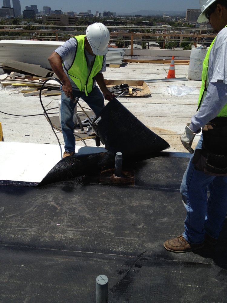 Slide of Ferguson & Melvin Roofing Contractor