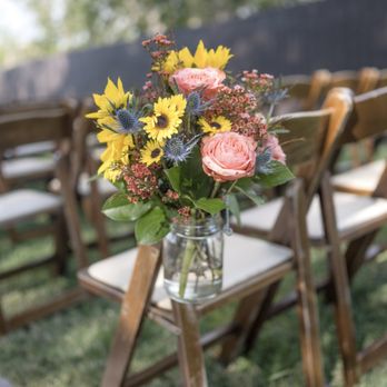 Jazz Bouquet Floral - a vase of flowers on a wooden chair - Florists Near Me - Sedona, Arizona