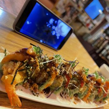 Dragon Sushi - a plate of food on a table - Sushi Bars Near Me - Albuquerque, New Mexico
