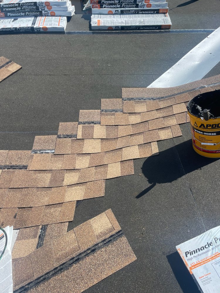 Slide of Arch Roofing & Repair