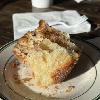 Upper Crust Bakery - Half eaten cinnamon roll - Bakeries Near Me - Austin, Texas