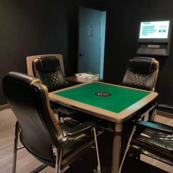 Marstin Billiards - a green table and chairs - Pool Halls Near Me - Vancouver, British Columbia Marstin Billiards - a green table and chairs - Pool Halls Near Me - Vancouver, British Columbia