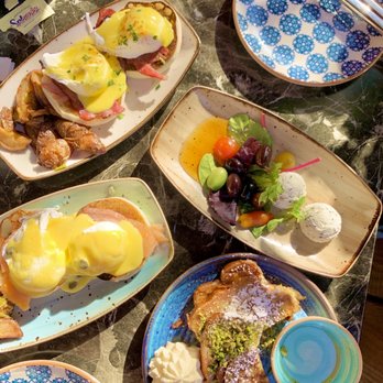 Agora DC - Baklava French toast, two style of eggs Benedict, herb goat cheese & honey. - Mediterranean Near Me - Washington, DC, District of Columbia