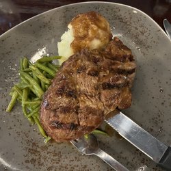 NY strip sirloin, green beans, mashed potatoes and gravy