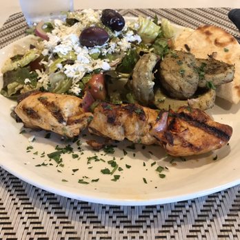 Olive Pit Grill - Brea - One chicken kebab plate, with my two small bites, roasted artichoke hearts (my fave!) and the Mediterranean salad. Comes with pita bread. - Greek Near Me - Brea, California Olive Pit Grill - Brea - One chicken kebab plate, with my two small bites, roasted artichoke hearts (my fave!) and the Mediterranean salad. Comes with pita bread. - Greek Near Me - Brea, California