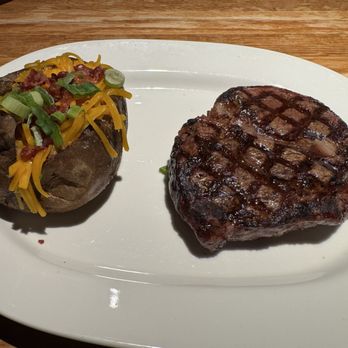 Boulevard American Bistro - Wood grilled ribeye and a loaded baked potato. - American Near Me - Metairie, Louisiana Boulevard American Bistro - Wood grilled ribeye and a loaded baked potato. - American Near Me - Metairie, Louisiana