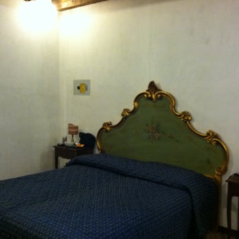 Pensione Guerrato - One of the rooms, with an available free-standing cot. - Hotels Near Me - Venezia, VE