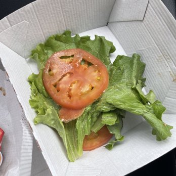 Chick-fil-A - ows a sandwich with lettuce and tomatoes - Fast Food Near Me - The Woodlands, Texas Chick-fil-A - ows a sandwich with lettuce and tomatoes - Fast Food Near Me - The Woodlands, Texas