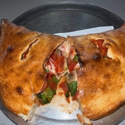 NY Pizza - Spinach, pepperoni, garlic and mushroom Stromboli.   amazing