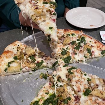 Pour House Pints And Pies - The Dude + pesto drizzle - Pizza Near Me - Austin, Texas Pour House Pints And Pies - The Dude + pesto drizzle - Pizza Near Me - Austin, Texas