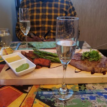 Iza Whiskey & Eats - Delicious ribeye, asparagus cooked to perfection, and sweet + regular potatoes with a little Prosecco! - Sushi Bars Near Me - Carrboro, North Carolina